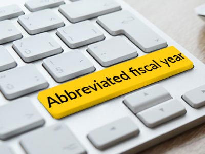 Shortened fiscal year with SLT Consulting